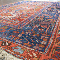 Fine Karaja Rug - This is a very lovely example of this popular group of North-West Persian rugs. The terracotta background in the field is a beautiful colour, and is centred by three geometric medallions. The central medallion has a very lovely camel colour around the outside. The rest of the field is decorated with myriad stylised floral ornaments. Note two the dramatic border which is wide and decorated with stylised trees and blossoms. The colours are all natural and the wool is exceptionally soft. Very good condition with its original ends and sides intact. Very tactile velvety pile, and fine supple weave. This is a very decorative rug which would add colour and vibrancy to any setting. Professionally cleaned. Image of Fine Karaja Rug